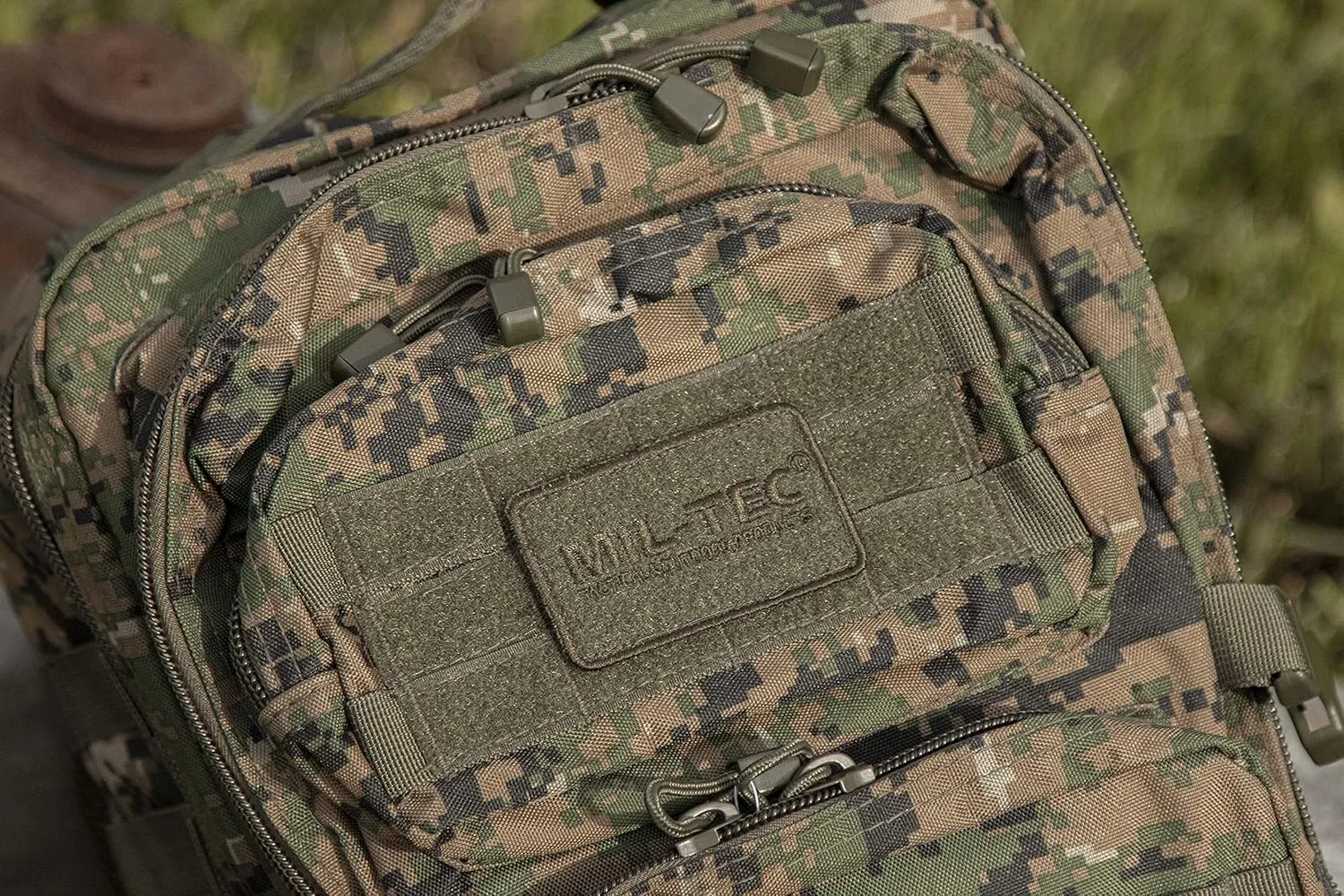 Mil-Tec Unisex Assault Pack - Rugged Durable Lightweight Ergonomic Versatile Tactical Outdoor Camping Hiking Backpack with Adjustable Padded Shoulder Straps & MOLLE Loops, Digital Woodland Camo, 36L
